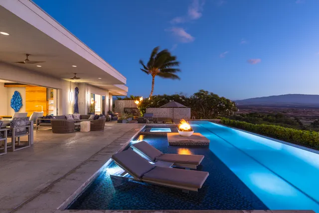 a view of a balcony with dining table and chairs with wooden floor