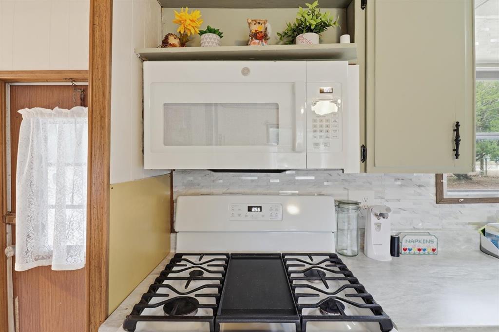 7749 West Chassahowitzka Street Homosassa, FL 34446 - Photo 13 of 30 a bathroom with a sink a mirror and vanity