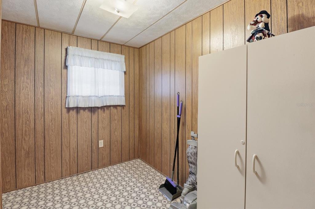 7749 West Chassahowitzka Street Homosassa, FL 34446 - Photo 19 of 30 a bedroom with a bed and a window