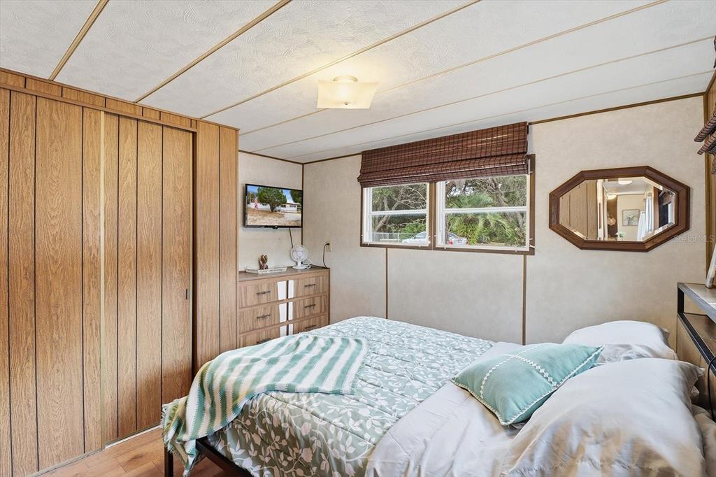 7749 West Chassahowitzka Street Homosassa, FL 34446 - Photo 23 of 30 a bedroom with a bed and a dresser