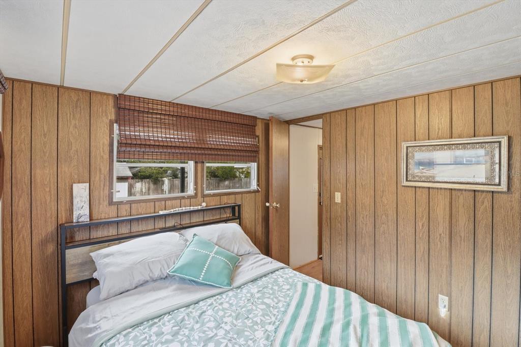 7749 West Chassahowitzka Street Homosassa, FL 34446 - Photo 24 of 30 a bedroom with a large bed and a window