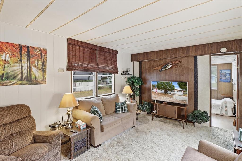 7749 West Chassahowitzka Street Homosassa, FL 34446 - Photo 8 of 30 a living room with furniture and a window