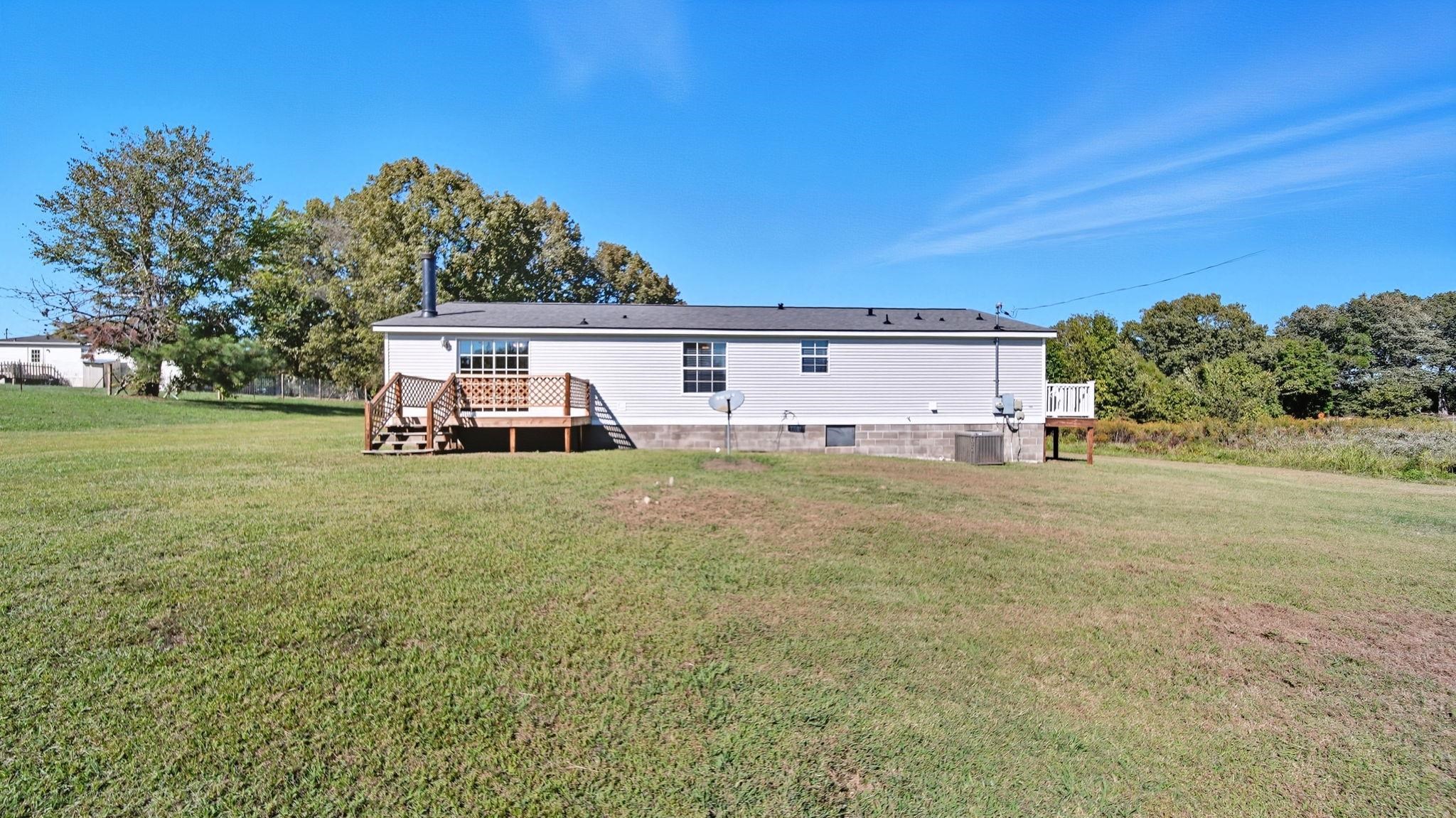 835 Robertson Road Mason, TN 38049 - Photo 20 of 22 a house view with a garden space