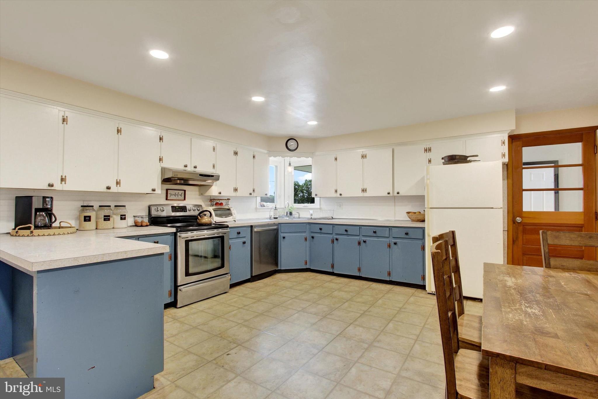 651 Gitts Run Road Hanover, PA 17331 - Photo 8 of 29 a kitchen with stainless steel appliances granite countertop a refrigerator sink and stove