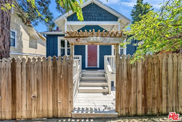 a front view of a house with a porch