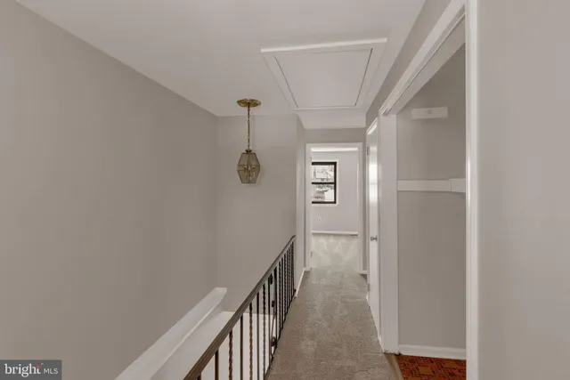 a view of hallway with stairs