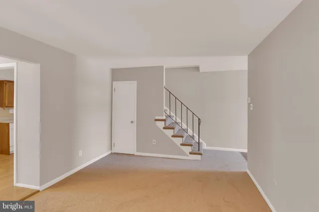 a view of entryway with stairs