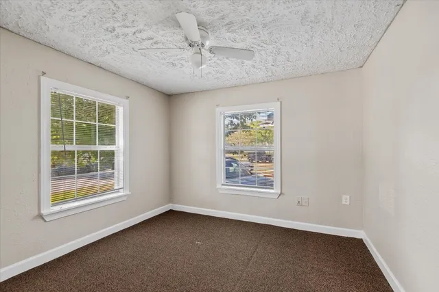 an empty room with windows