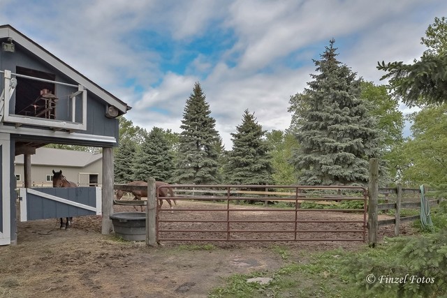 3S559 Norris Road Sugar Grove, IL 60554 - Photo 23 of 30 a view of wooden fence and trees