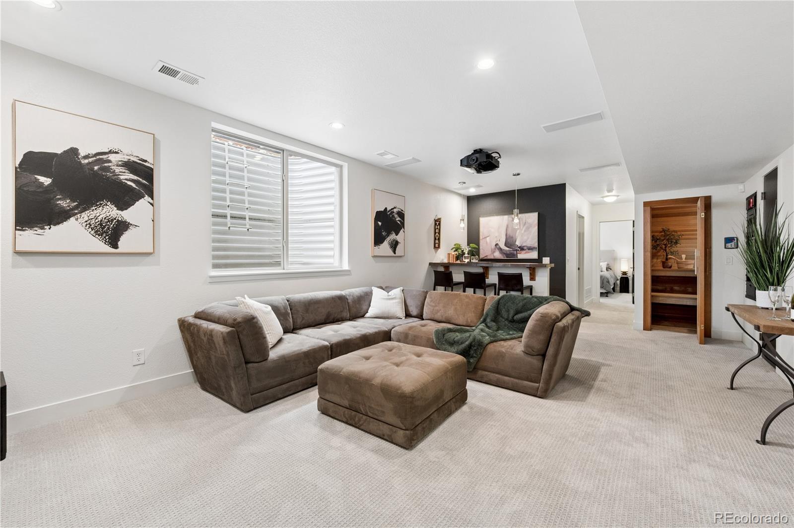 3118 Newton Street Denver, CO 80211 - Photo 14 of 29 a living room with furniture and a large window