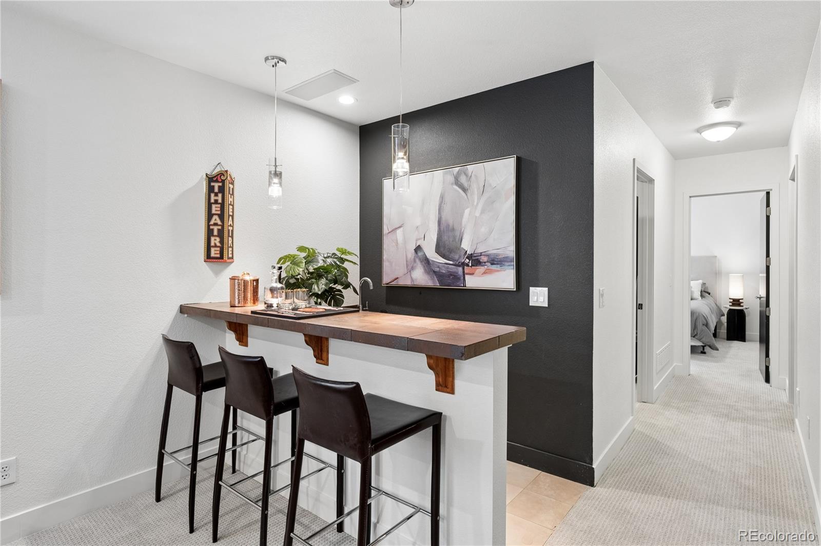 3118 Newton Street Denver, CO 80211 - Photo 15 of 29 a view of a dining room with furniture