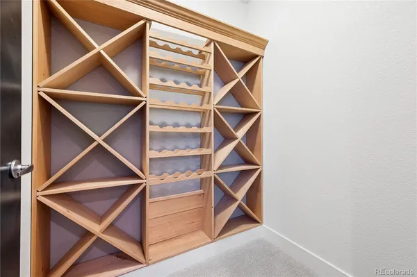 a en suite bathroom with a double vanity sink and a mirror