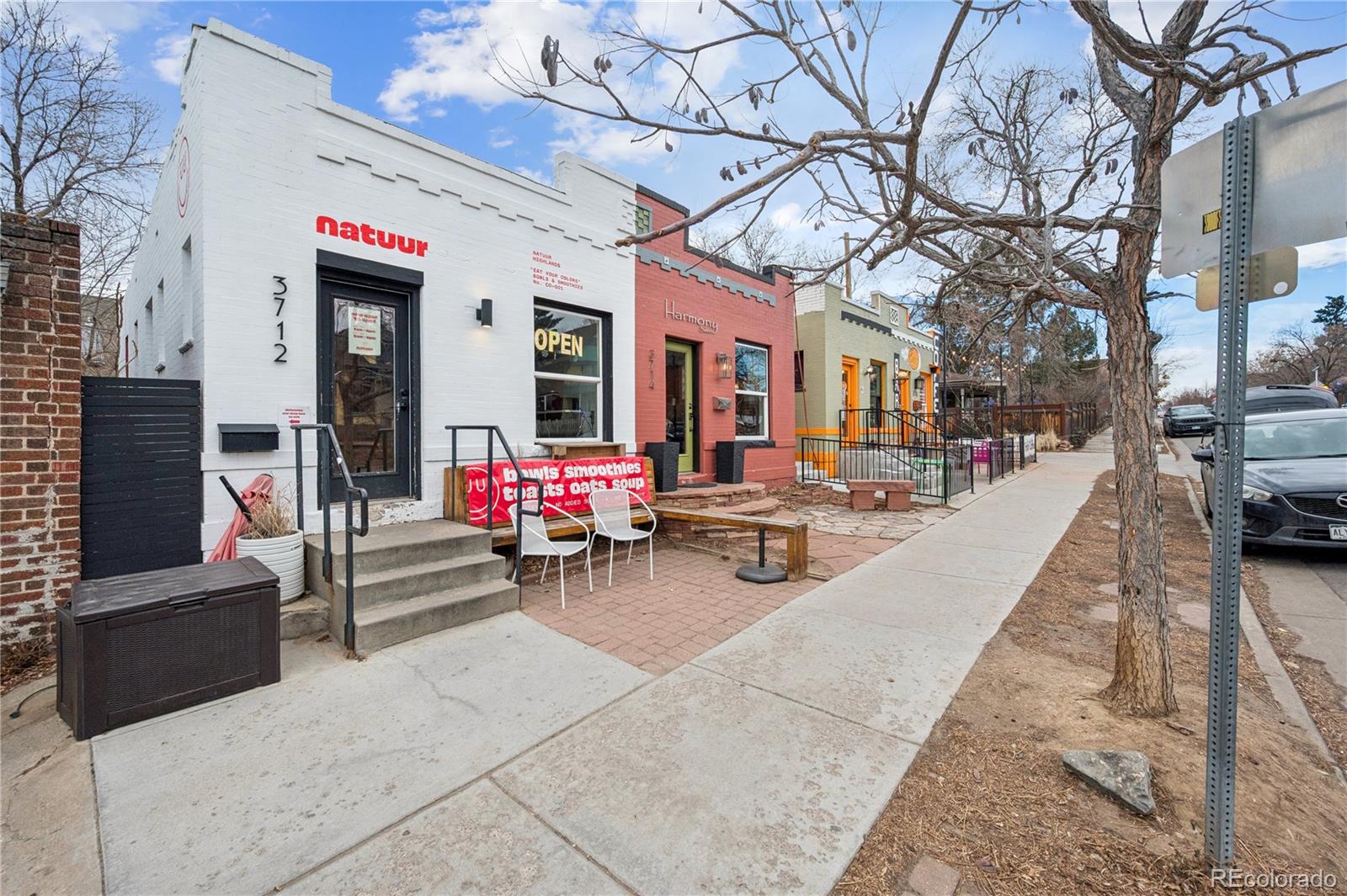 3118 Newton Street Denver, CO 80211 - Photo 27 of 29 a view of a chairs and tables in the patio