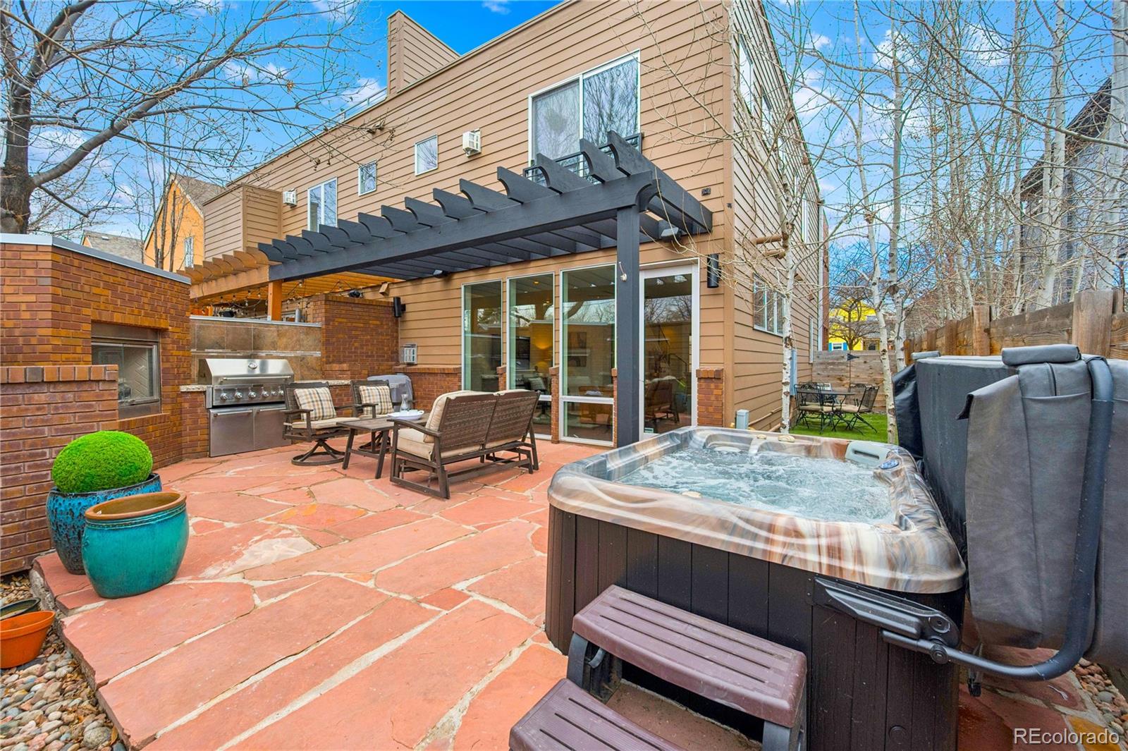 3118 Newton Street Denver, CO 80211 - Photo 6 of 29 a view of a patio with a table and chairs