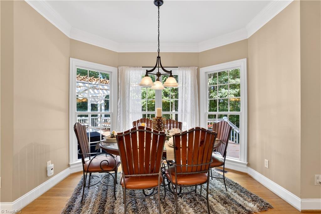 8508 Rosedale Drive Oak Ridge, NC 27310 - Photo 17 of 50 Morning coffee with a treetop view.