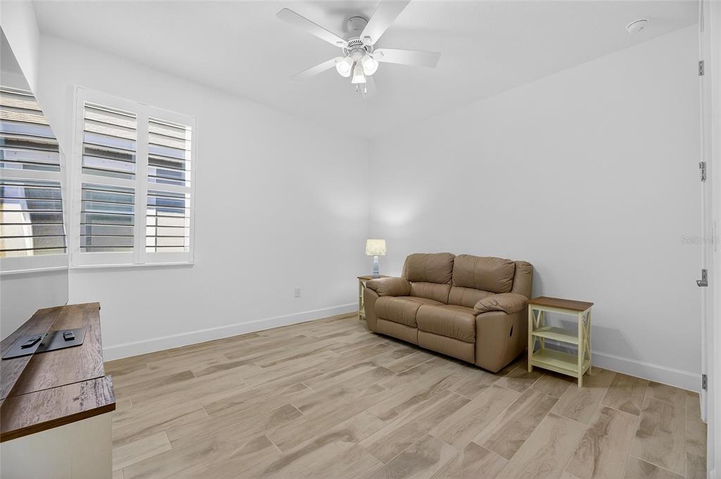 994 Signet Drive Apollo Beach, FL 33572 - Photo 47 of 98 a living room with furniture and a window