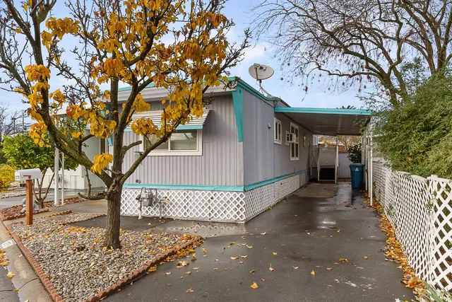 a view of a entrance gate of a house