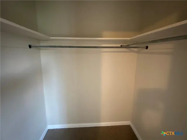 a view of a room with racks on the wall