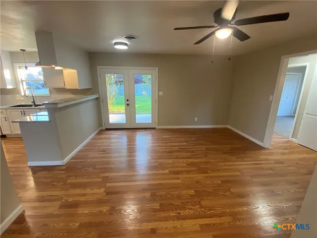 a view of a kitchen with a sink