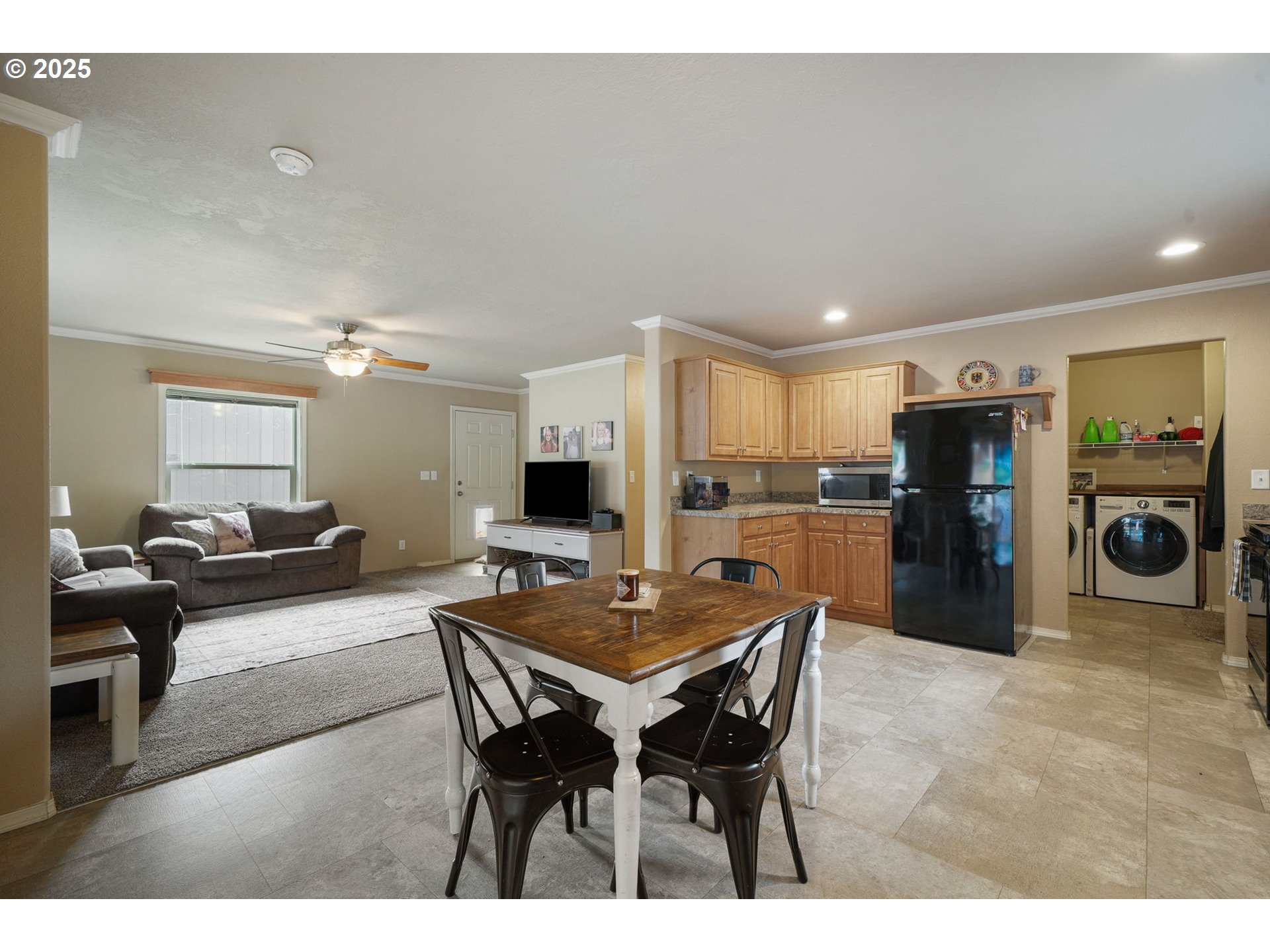 176 West Main Street Alsea, OR 97324 - Photo 4 of 16 a living room with stainless steel appliances kitchen island granite countertop furniture and a view of kitchen