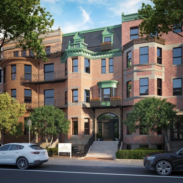 341 Commonwealth Avenue, Unit 3 Boston, MA 02115 - Photo 3 of 3 a view of multiple houses with a parking space