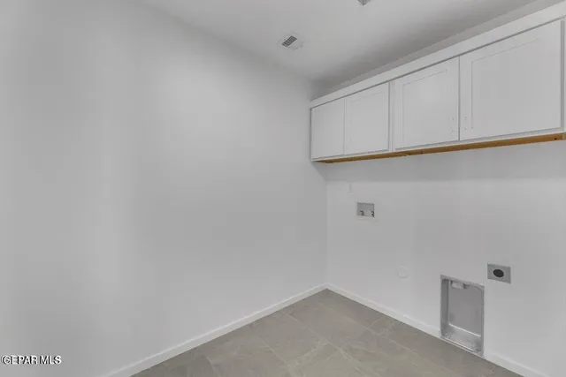 a view of a big room with kitchen view and wooden floor