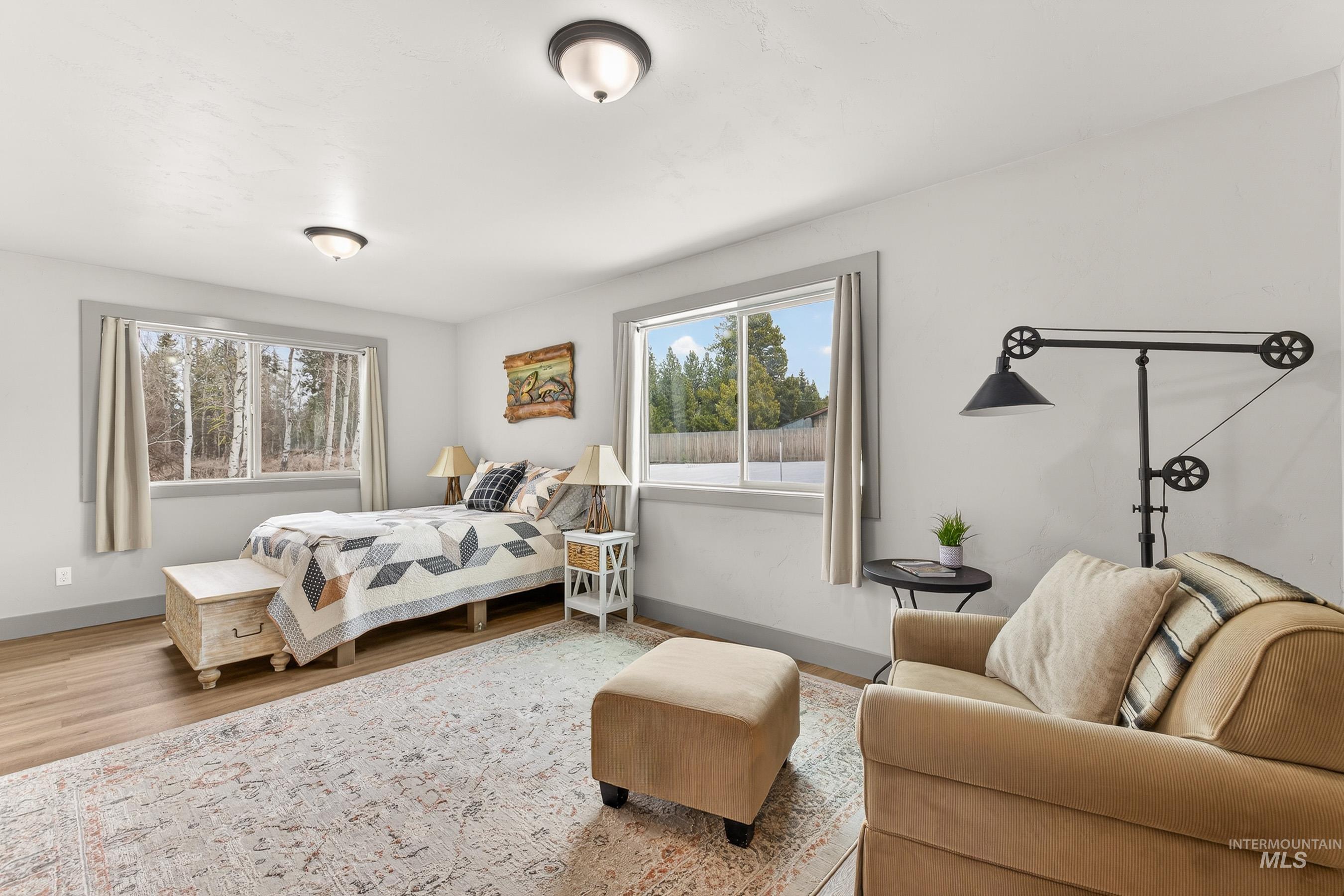 304 Samson Court, Unit 656 McCall, ID 83638 - Photo 11 of 29 Bedroom with wood finished floors and baseboards