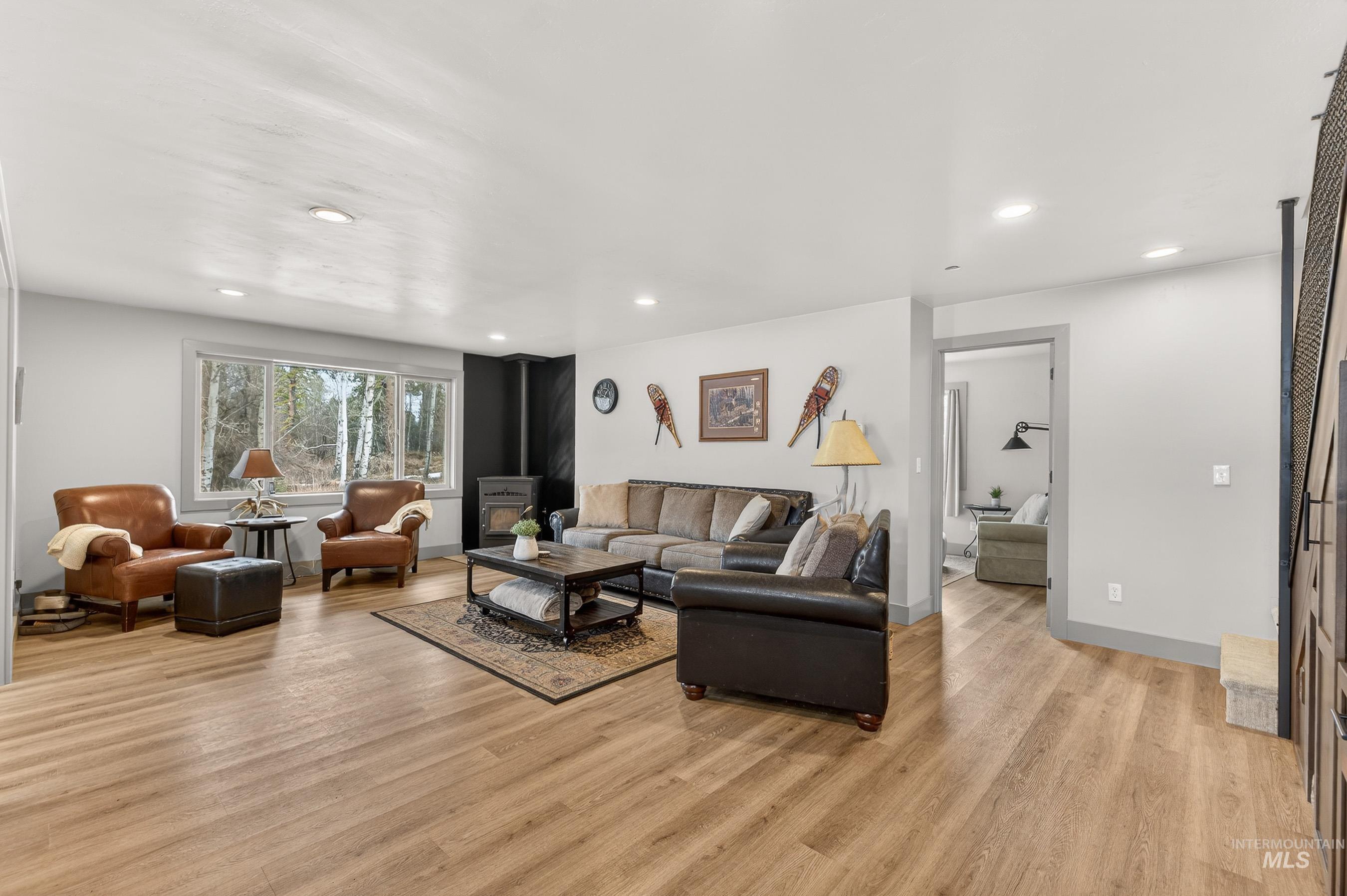 304 Samson Court, Unit 656 McCall, ID 83638 - Photo 2 of 29 Living room featuring light wood-style floors and recessed lighting
