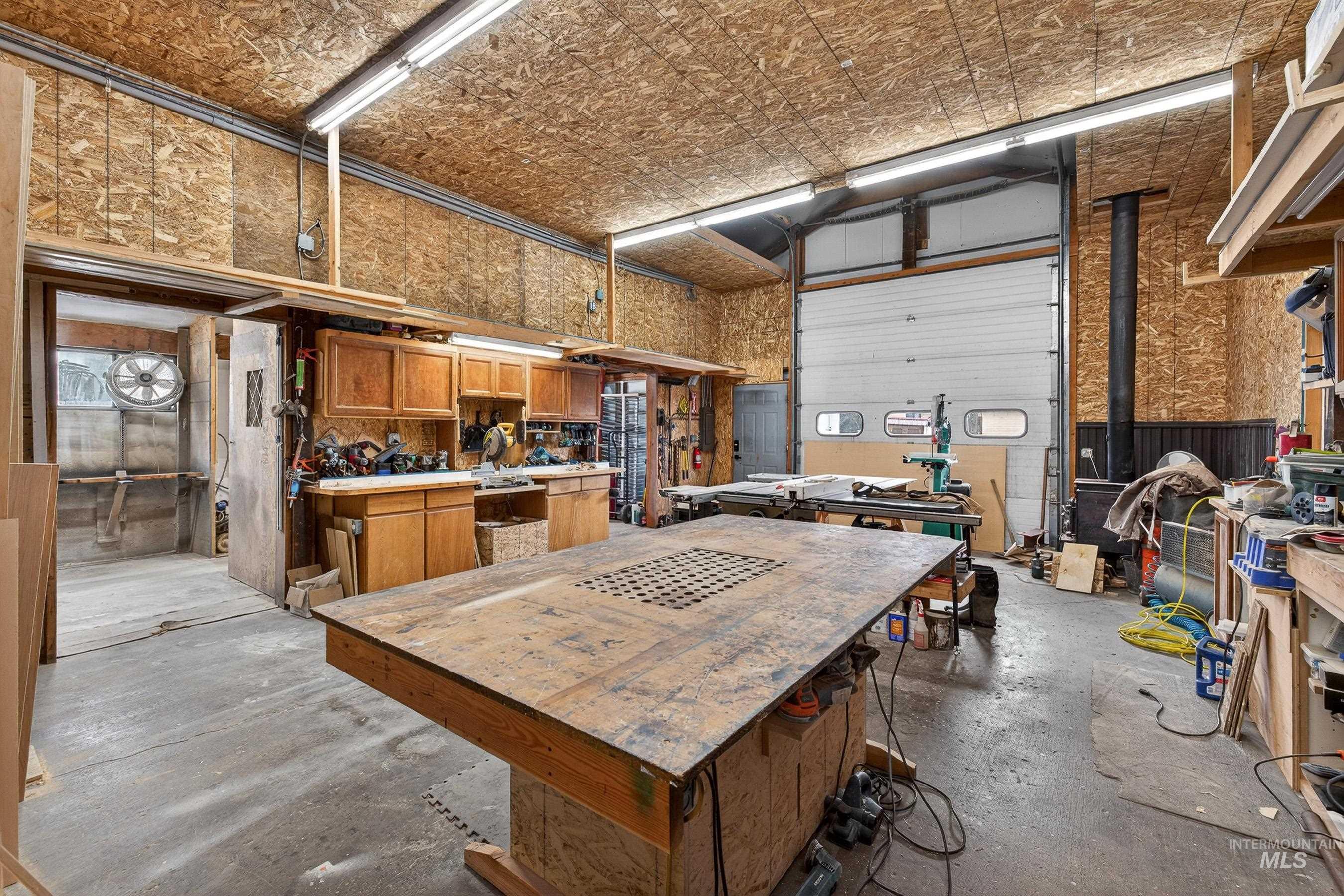 304 Samson Court, Unit 656 McCall, ID 83638 - Photo 22 of 29 Garage with a workshop area