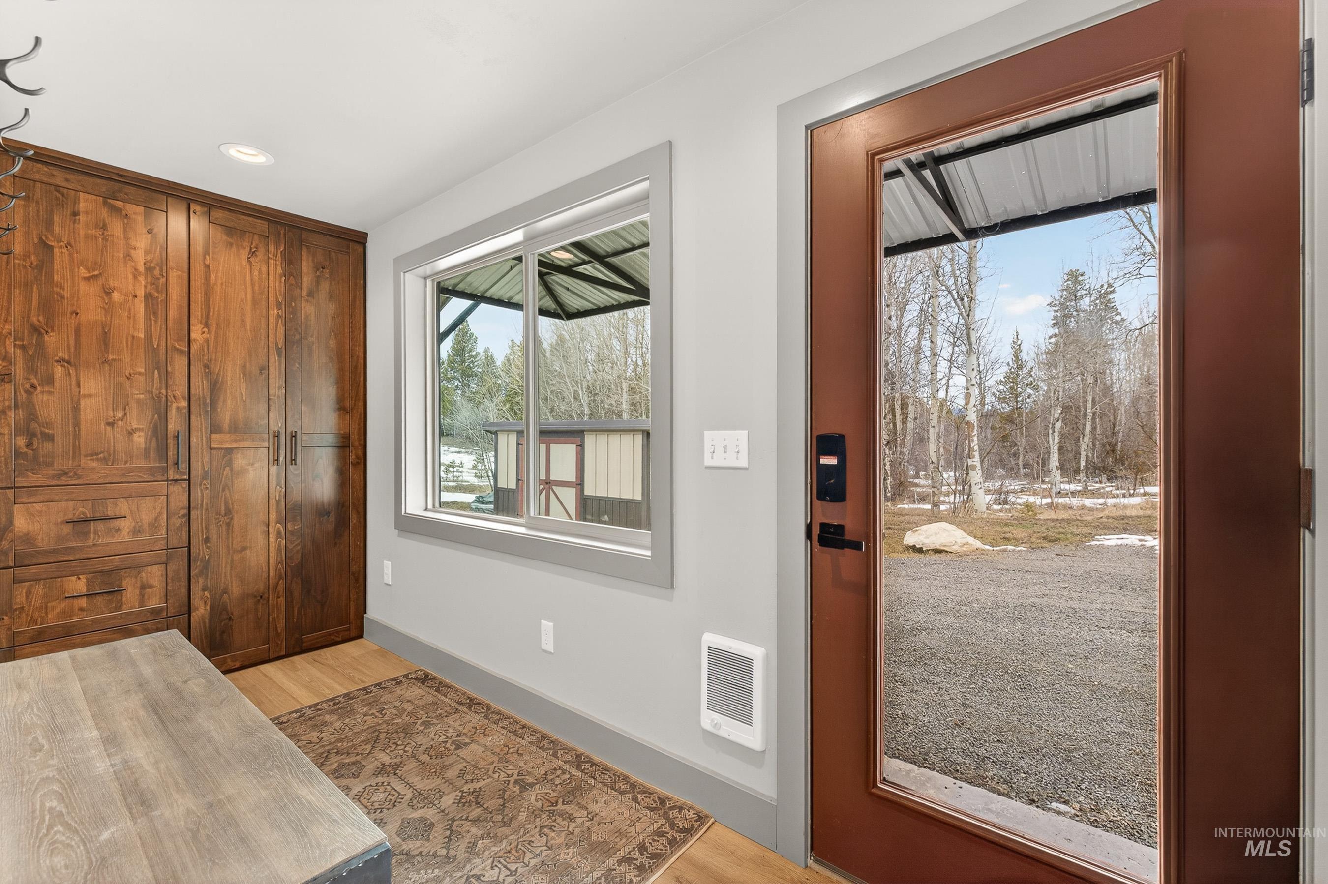 304 Samson Court, Unit 656 McCall, ID 83638 - Photo 23 of 29 Foyer entrance featuring light wood-type flooring, heating unit, and recessed lighting