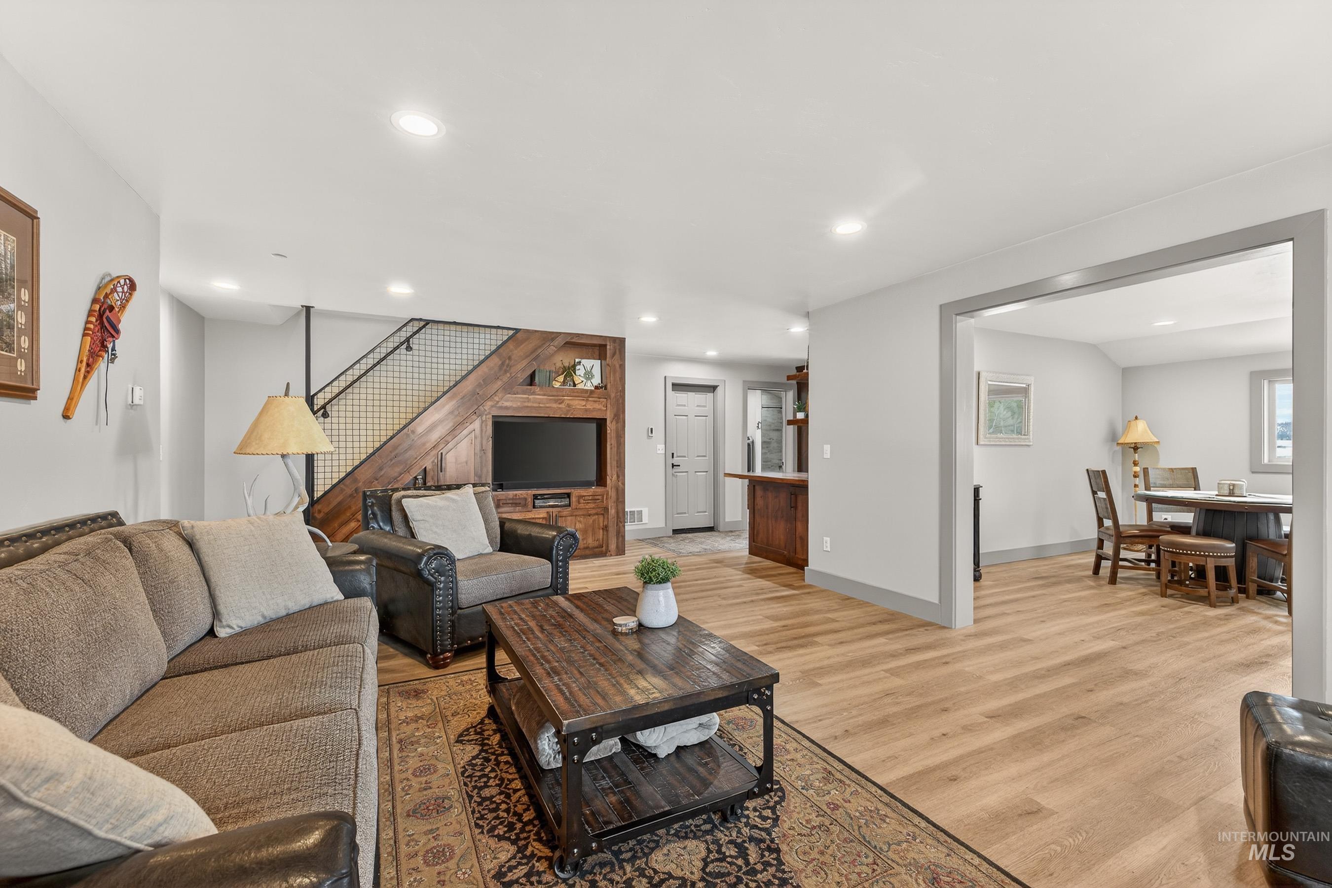 304 Samson Court, Unit 656 McCall, ID 83638 - Photo 3 of 29 Living room featuring light wood-style floors and recessed lighting