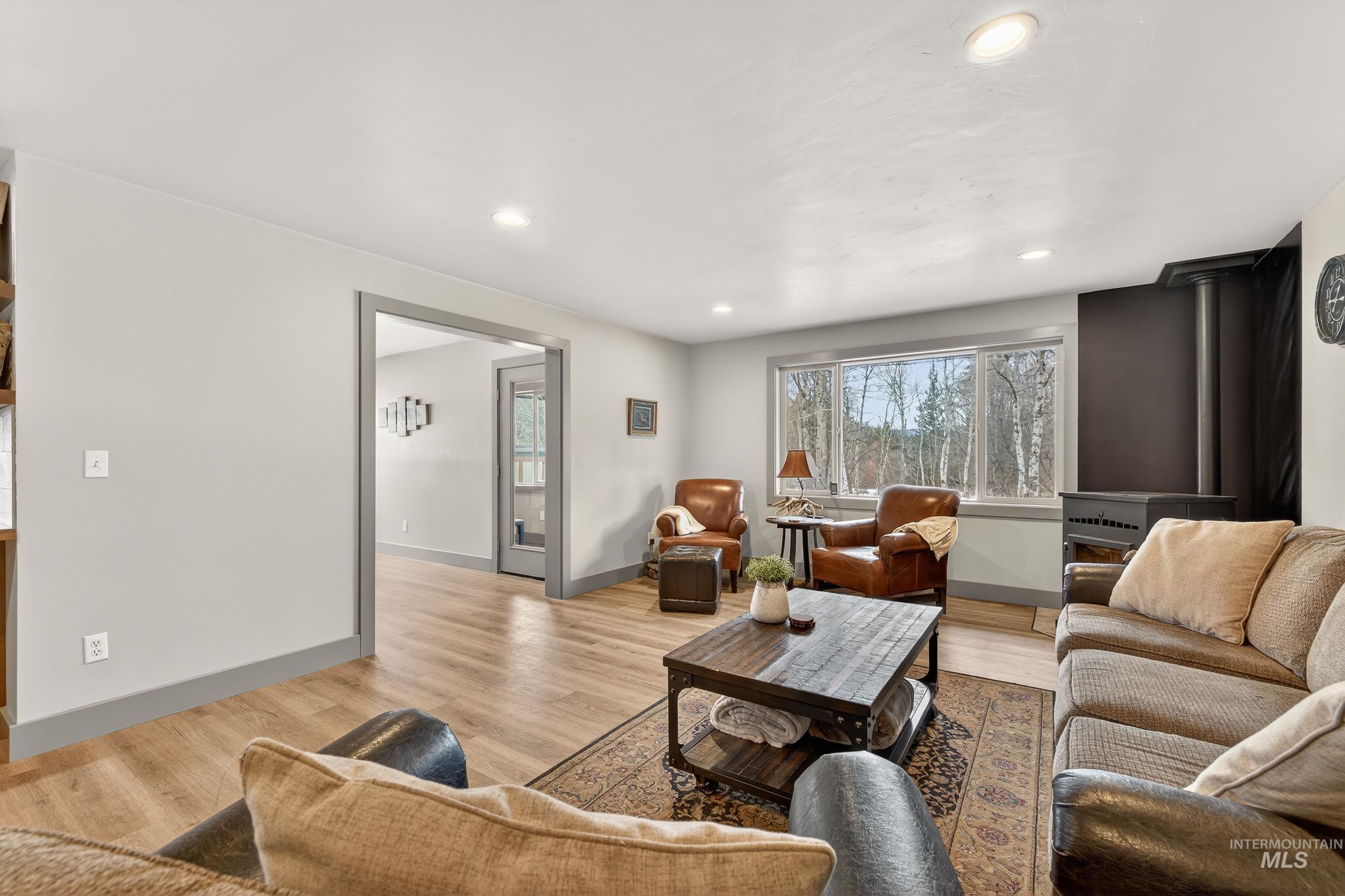 304 Samson Court, Unit 656 McCall, ID 83638 - Photo 4 of 29 Living room with light wood-type flooring and recessed lighting