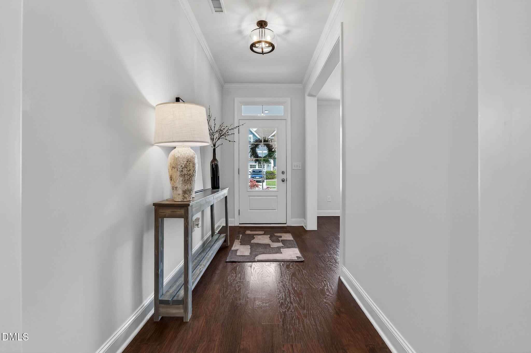 721 Hydrangea Field Court Wake Forest, NC 27587 - Photo 11 of 71 a view of entryway with wooden floor