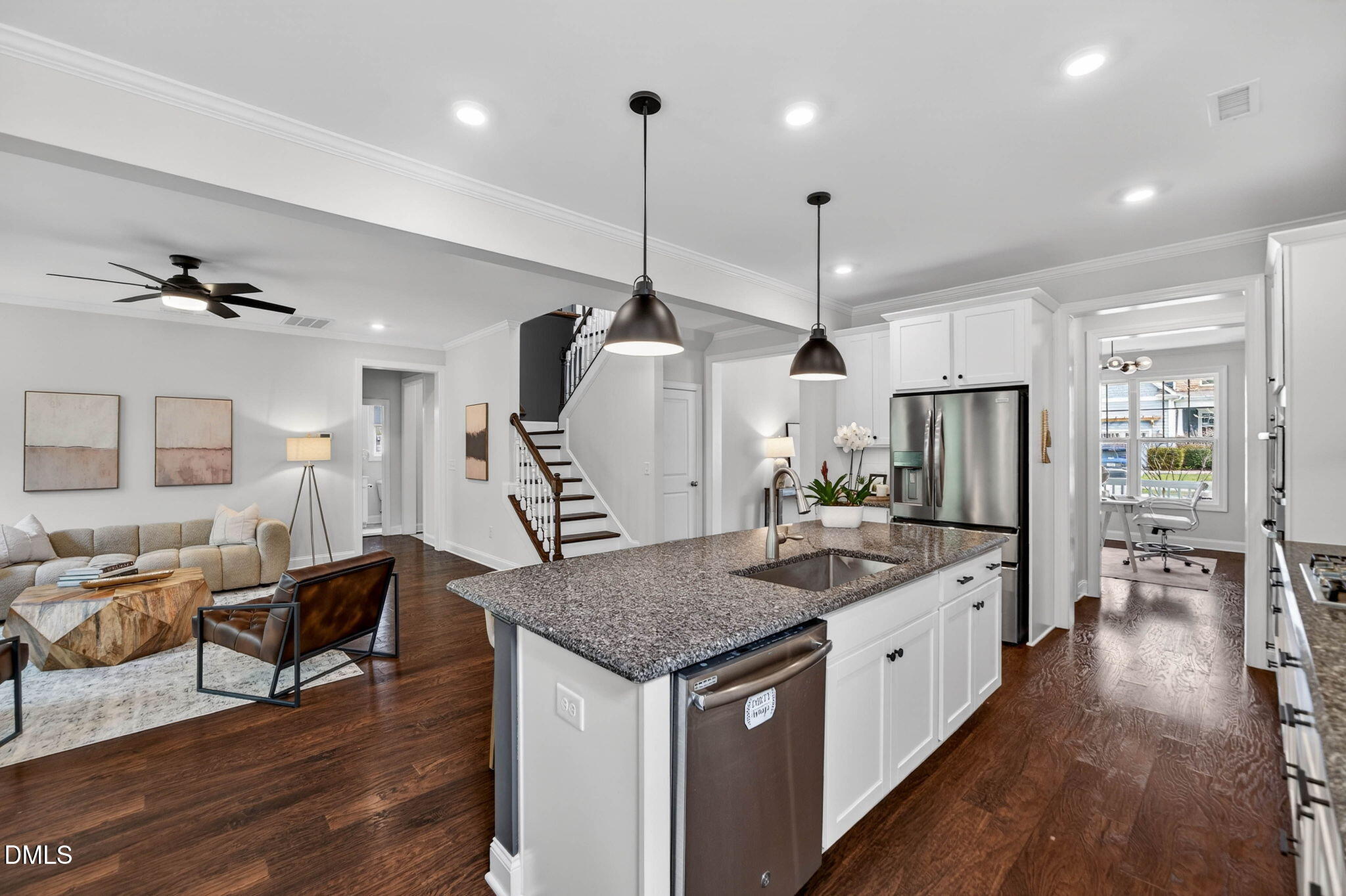721 Hydrangea Field Court Wake Forest, NC 27587 - Photo 71 of 71 a kitchen with stainless steel appliances granite countertop a kitchen island a stove and a wooden floors