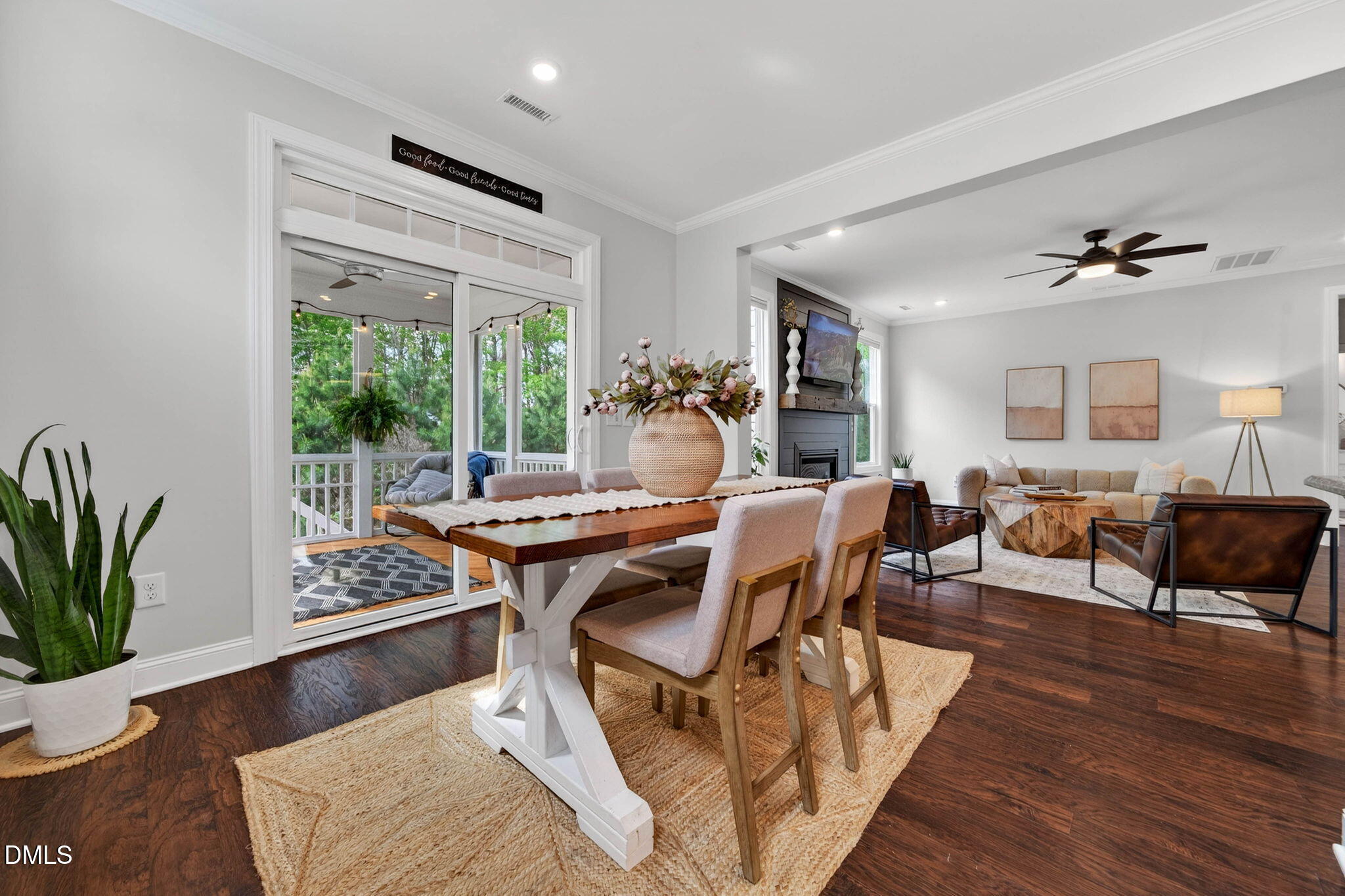 721 Hydrangea Field Court Wake Forest, NC 27587 - Photo 24 of 71 a view of a dining room with furniture window and wooden floor