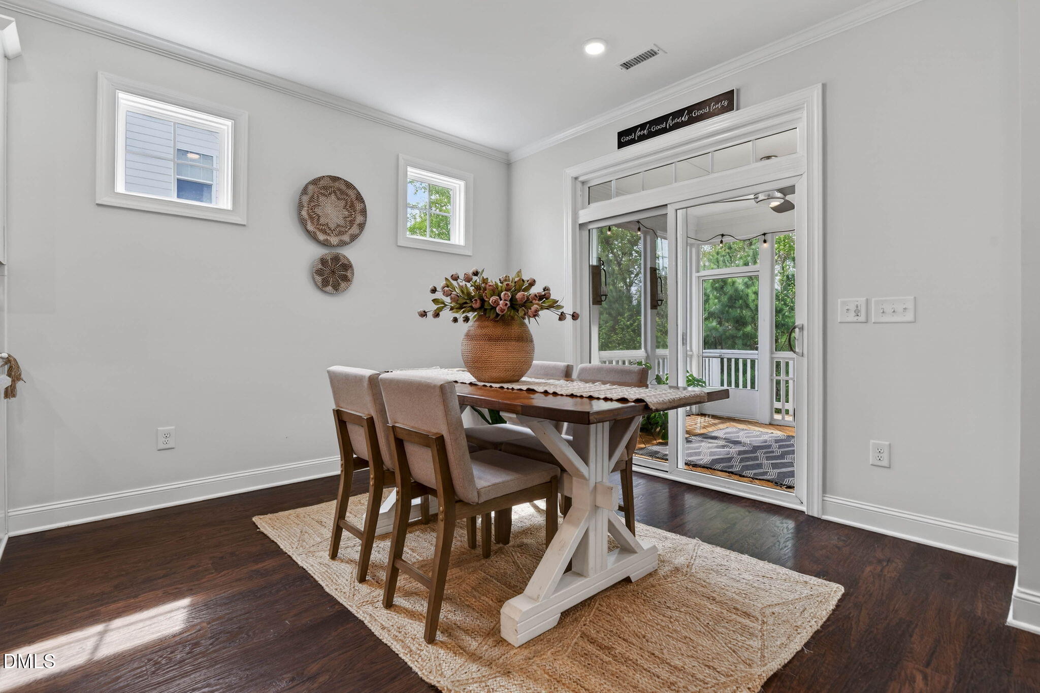 721 Hydrangea Field Court Wake Forest, NC 27587 - Photo 25 of 71 a view of a dining room with furniture window and wooden floor