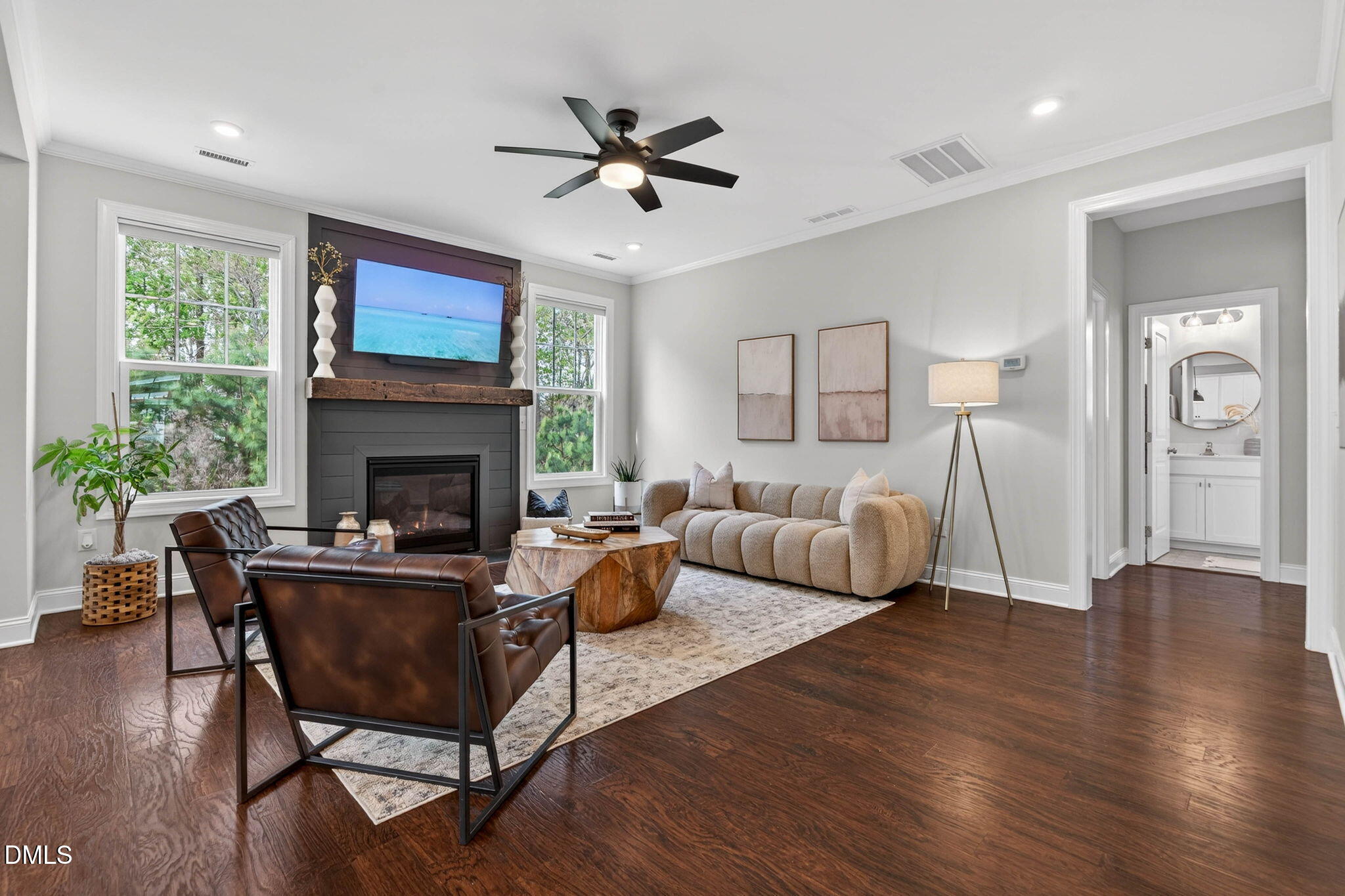 721 Hydrangea Field Court Wake Forest, NC 27587 - Photo 27 of 71 a living room with furniture and a fireplace