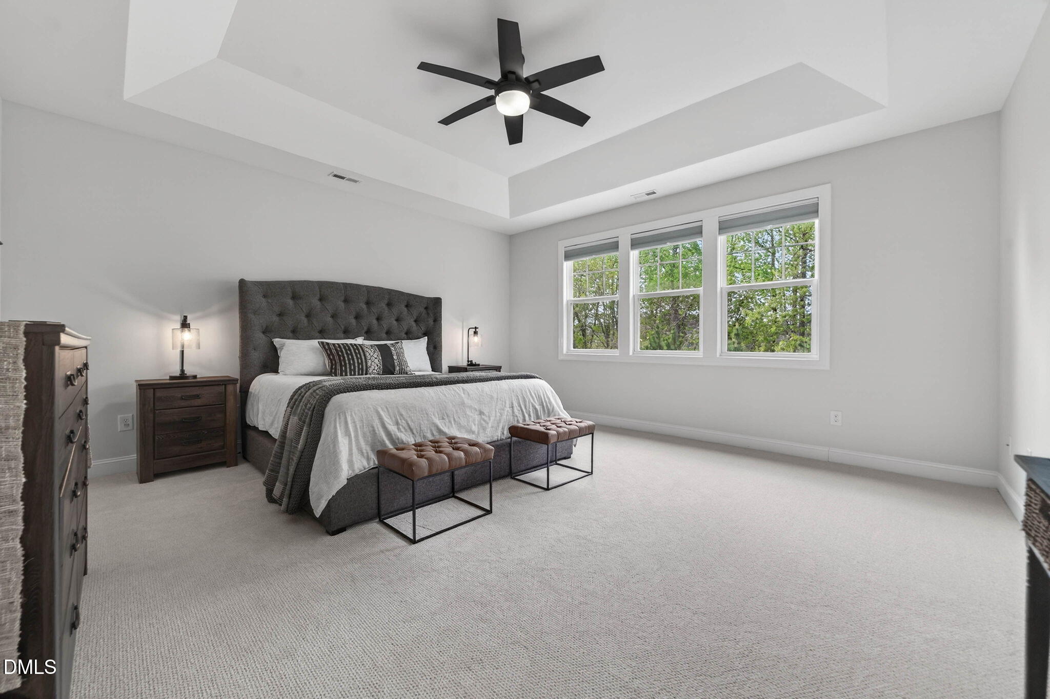 721 Hydrangea Field Court Wake Forest, NC 27587 - Photo 40 of 71 a bed sitting in a bedroom next to a window