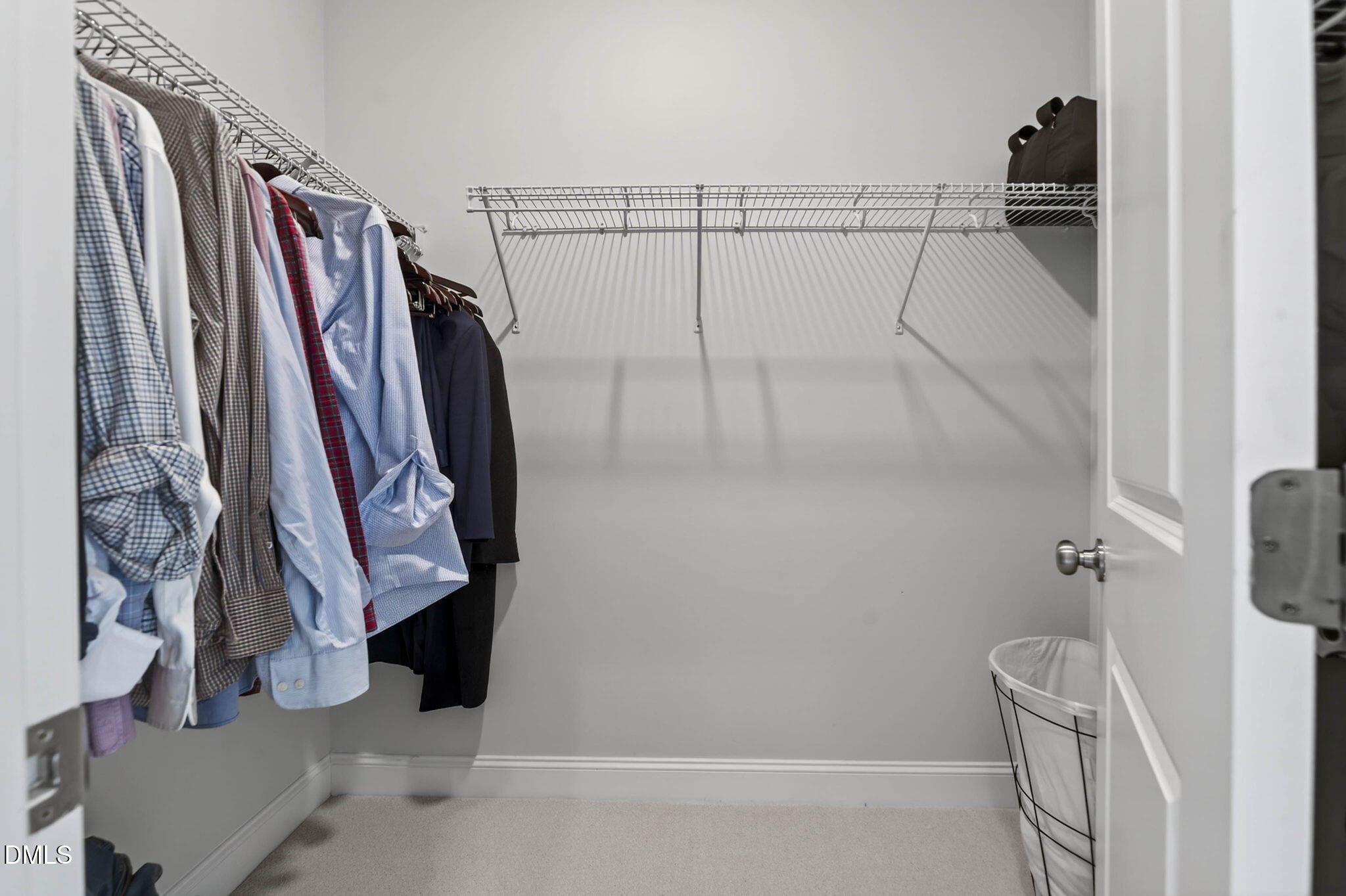 721 Hydrangea Field Court Wake Forest, NC 27587 - Photo 44 of 71 a view of walk in closet with clothes and shoes