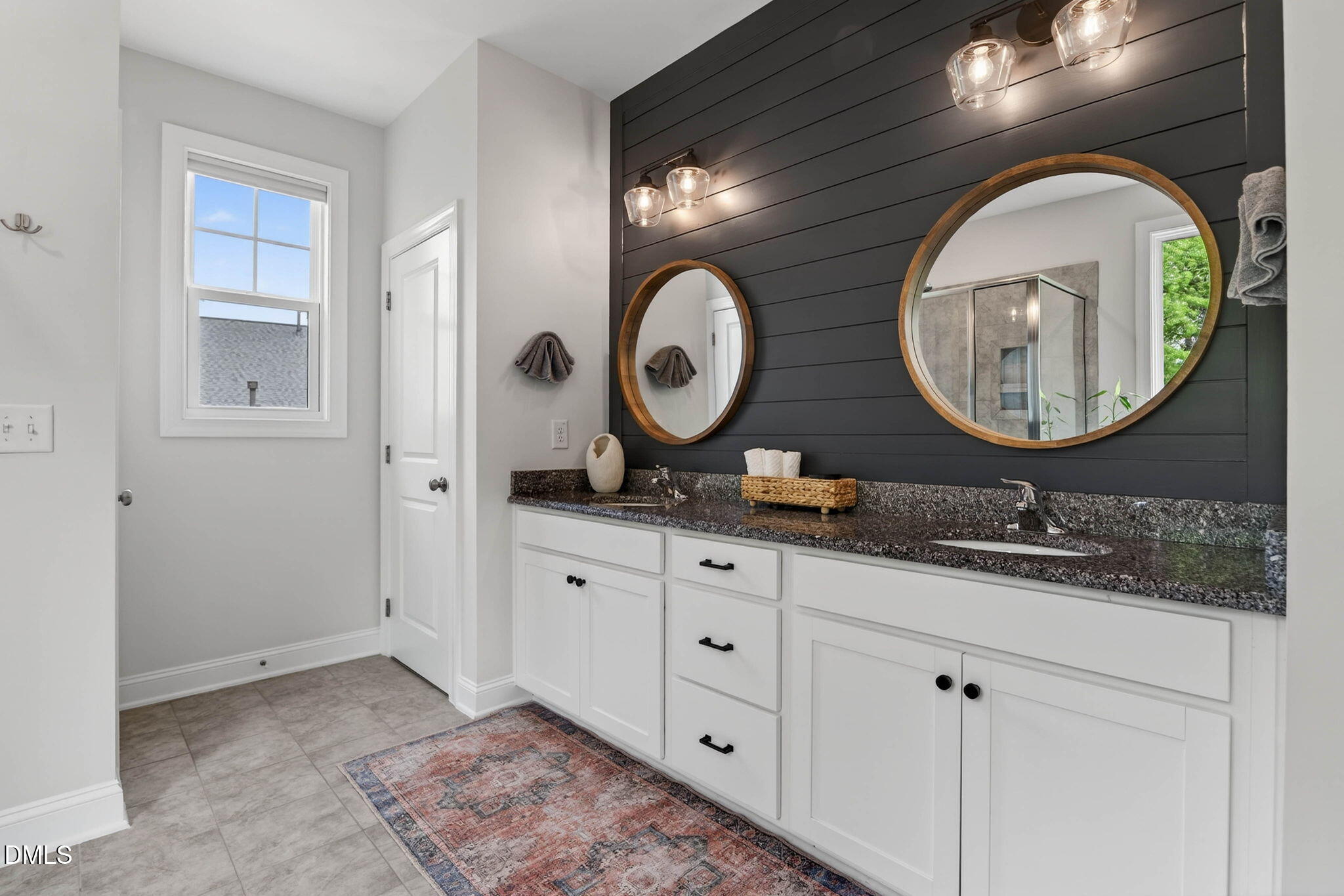 721 Hydrangea Field Court Wake Forest, NC 27587 - Photo 45 of 71 a bathroom with a granite countertop double vanity and a mirror