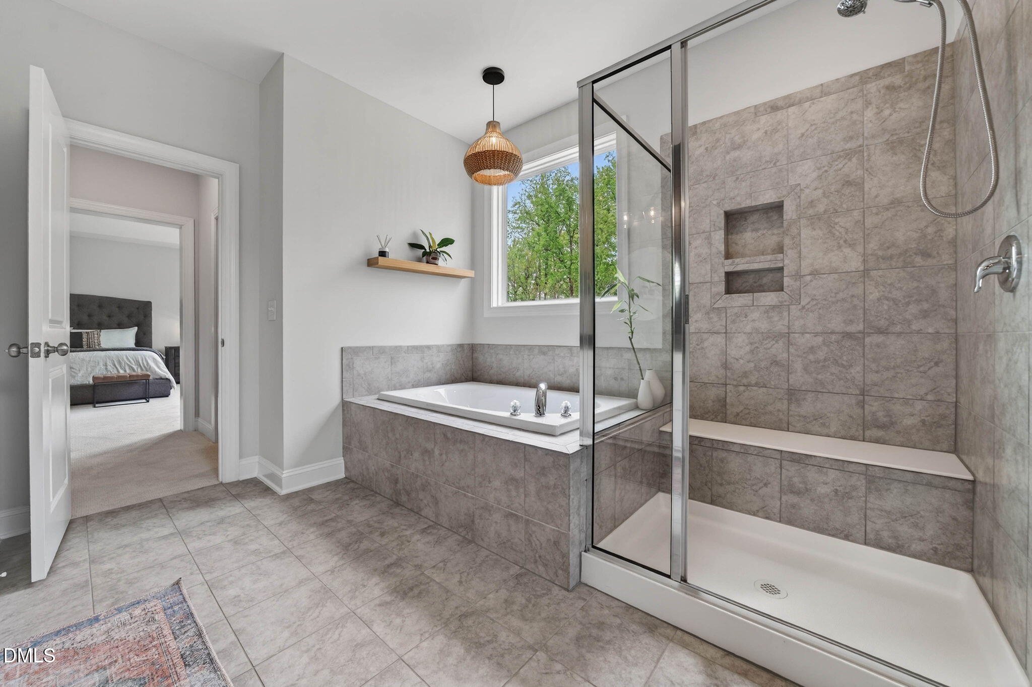 721 Hydrangea Field Court Wake Forest, NC 27587 - Photo 46 of 71 a bathroom with a tub and shower