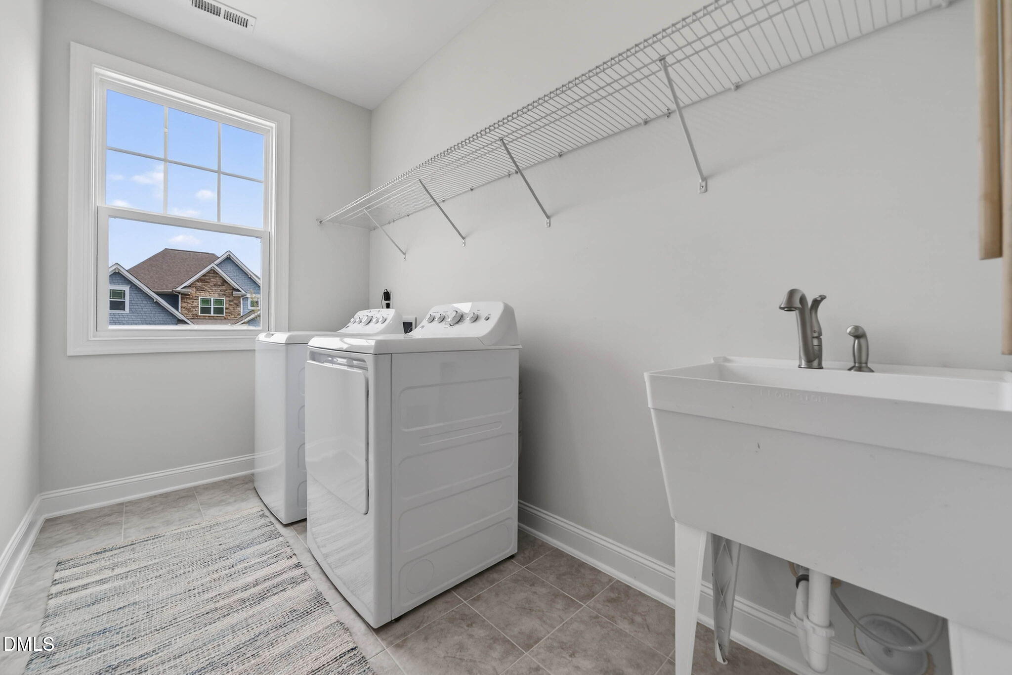 721 Hydrangea Field Court Wake Forest, NC 27587 - Photo 50 of 71 a view of a storage & utility room with closet window
