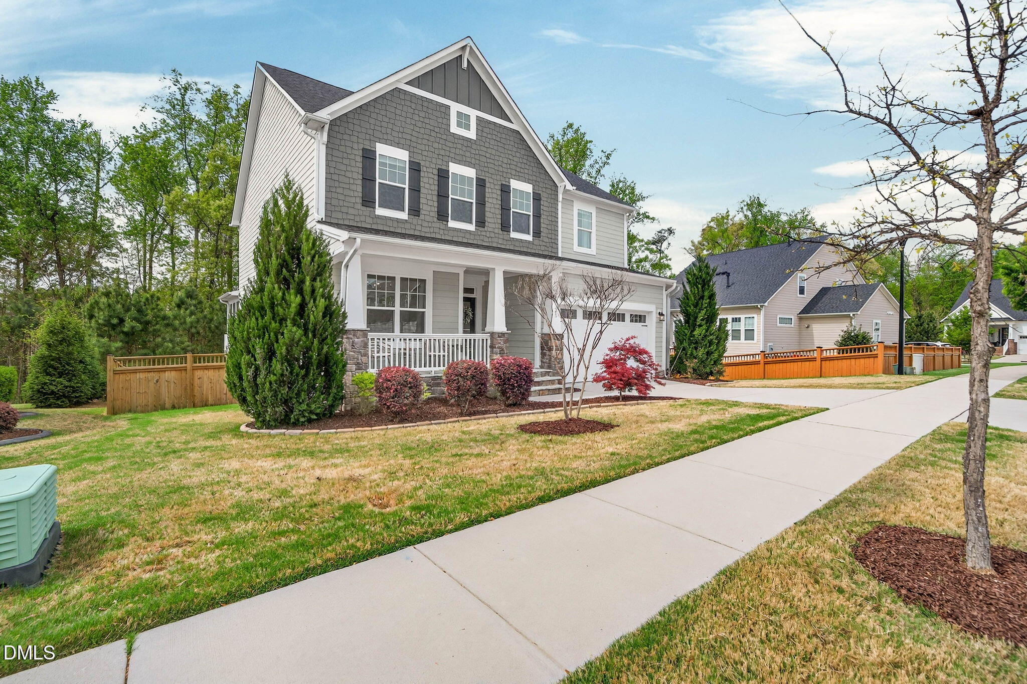 721 Hydrangea Field Court Wake Forest, NC 27587 - Photo 6 of 71 a front view of a house with a yard