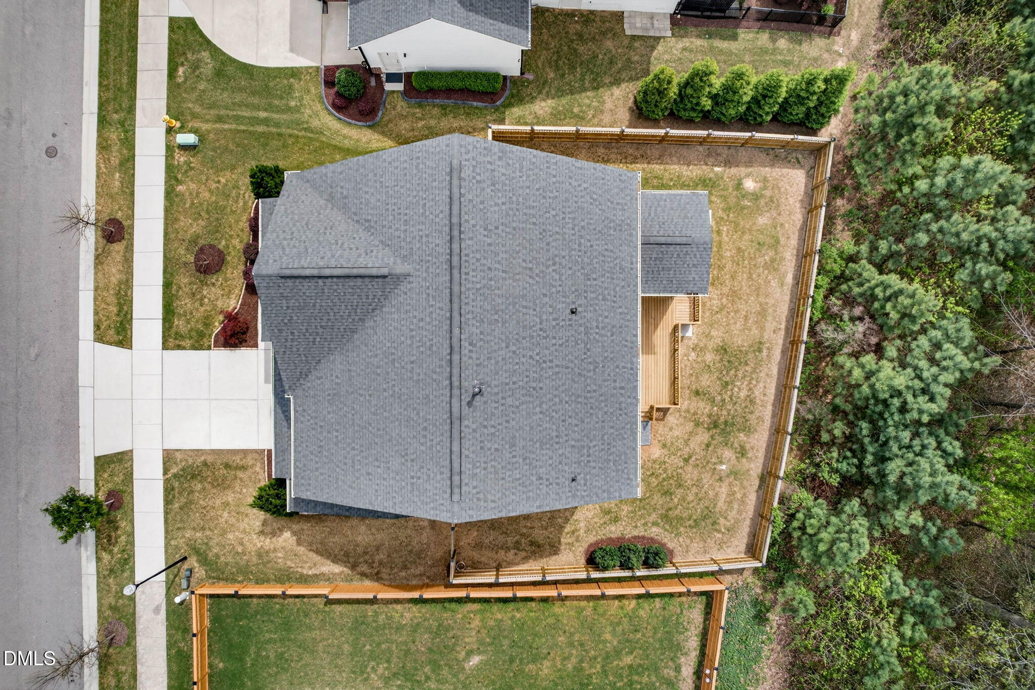 721 Hydrangea Field Court Wake Forest, NC 27587 - Photo 61 of 71 a aerial view of a house with a yard and large tree