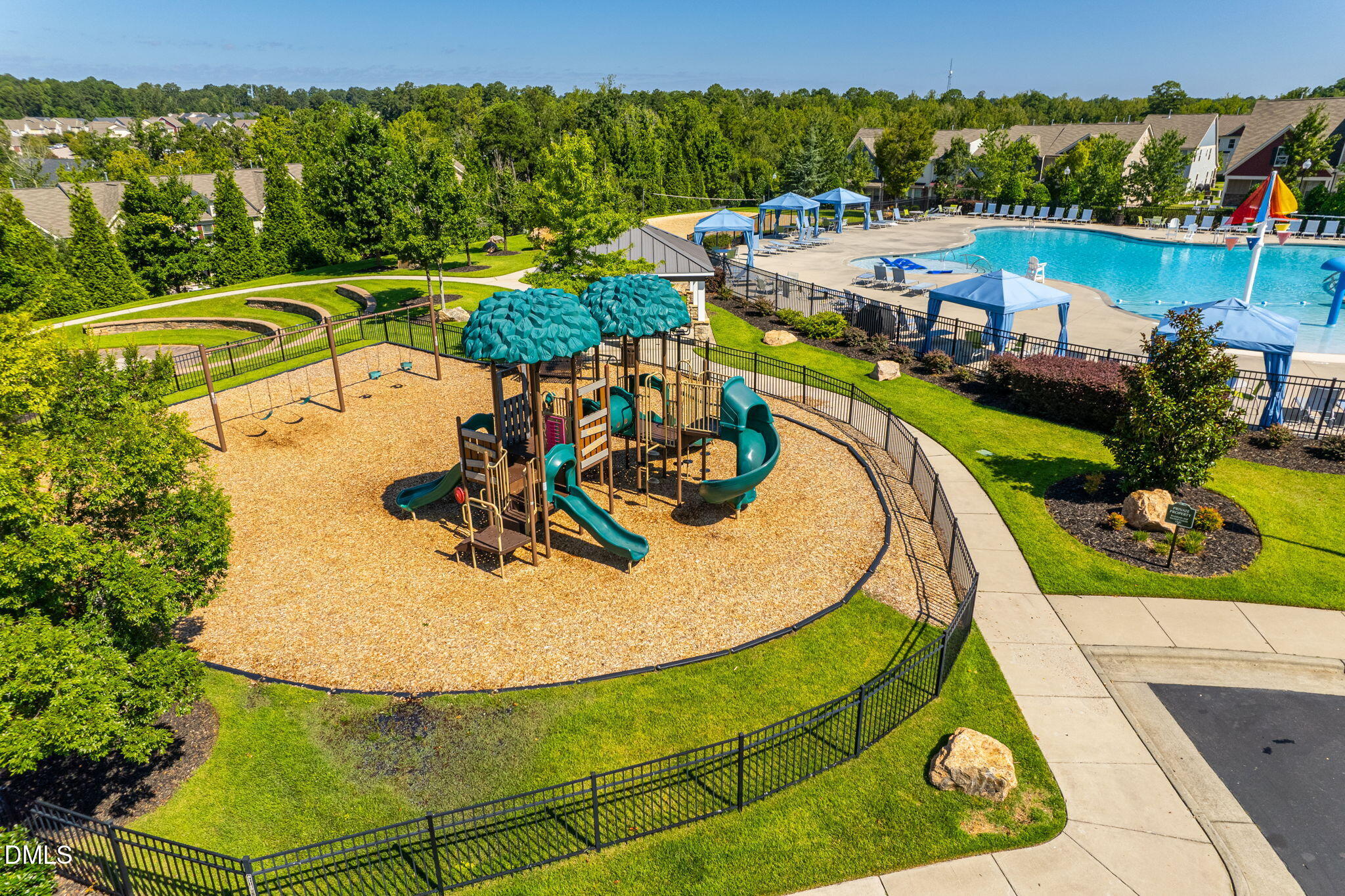 721 Hydrangea Field Court Wake Forest, NC 27587 - Photo 68 of 71 an aerial view of a swimming pool with a patio