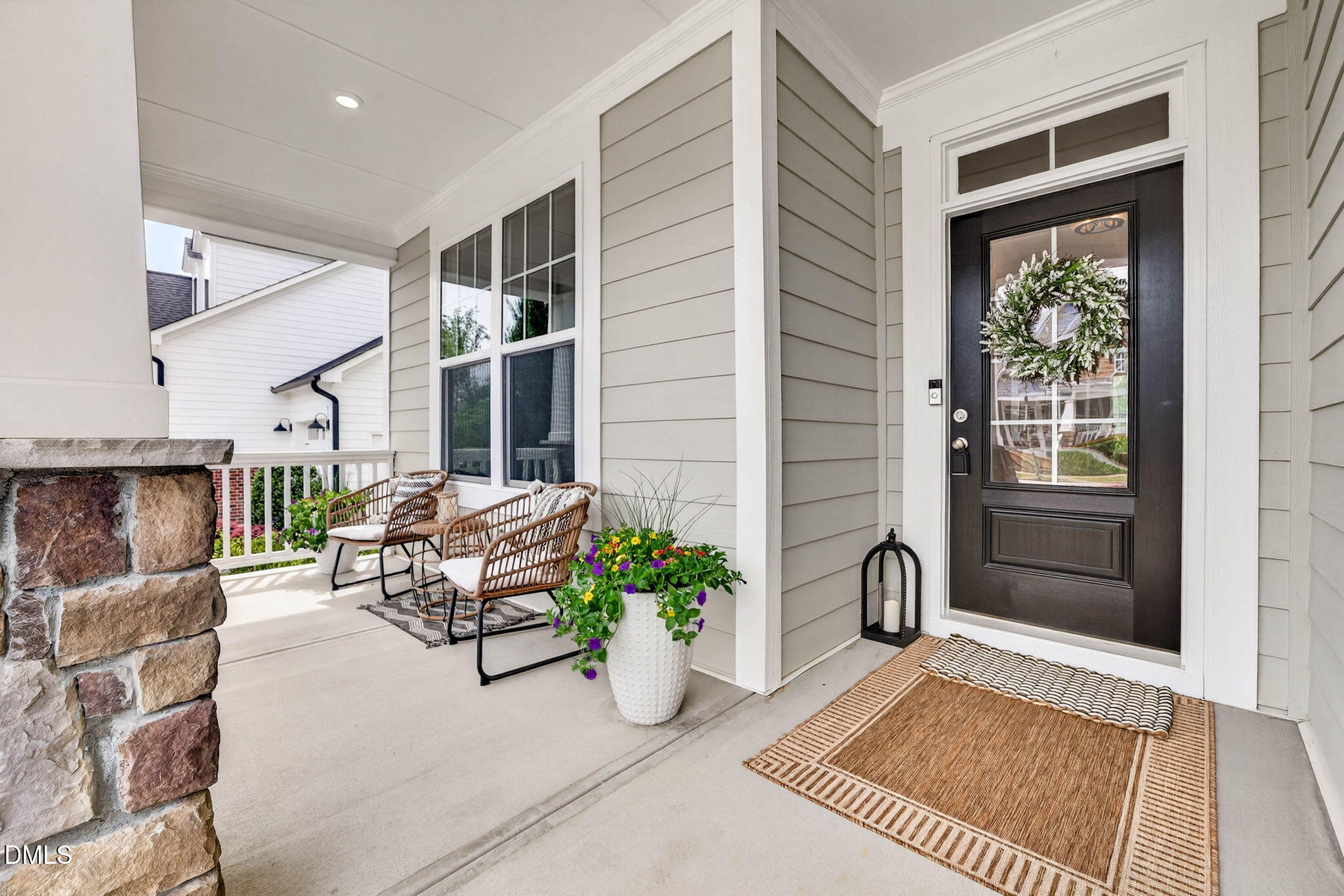 721 Hydrangea Field Court Wake Forest, NC 27587 - Photo 10 of 71 a living room with furniture and a potted plant