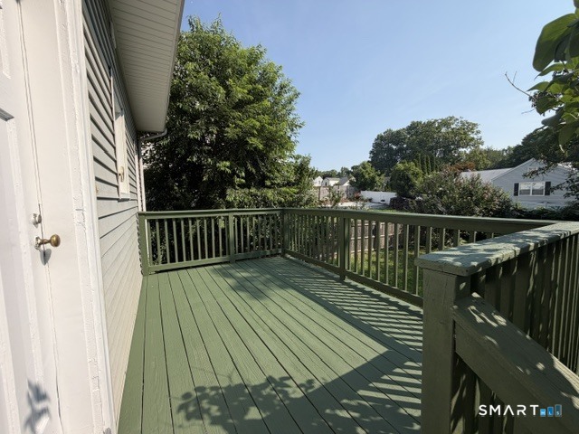 1770 Stratfield Road Fairfield, CT 06825 - Photo 34 of 40 a balcony with wooden floor