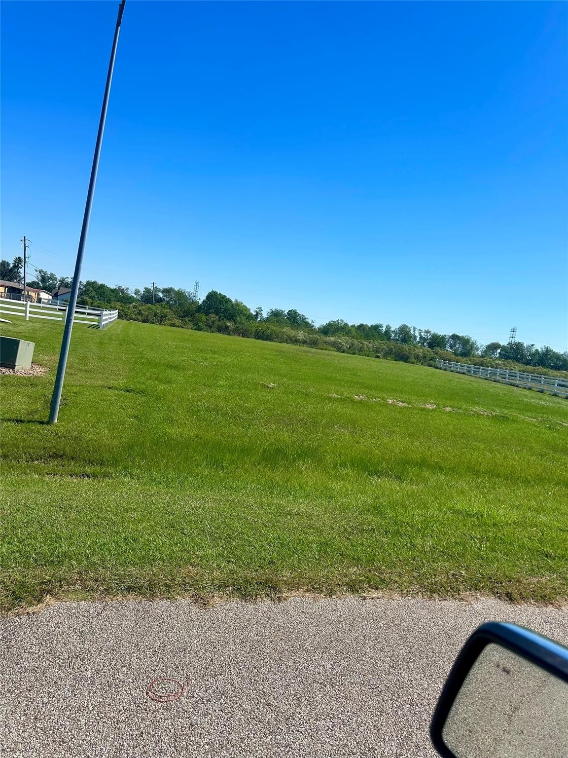 17327 Lake Ridge Circle Rosharon, TX 77583 - Photo 7 of 9 a view of a golf course with a lake