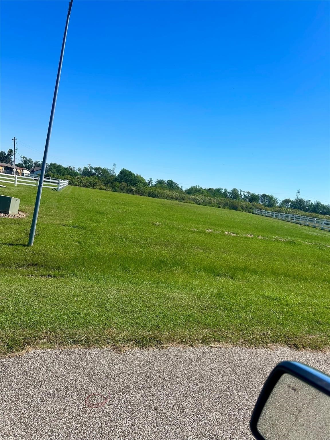 17327 Lake Ridge Circle Rosharon, TX 77583 - Photo 7 of 9 a view of a golf course with a lake