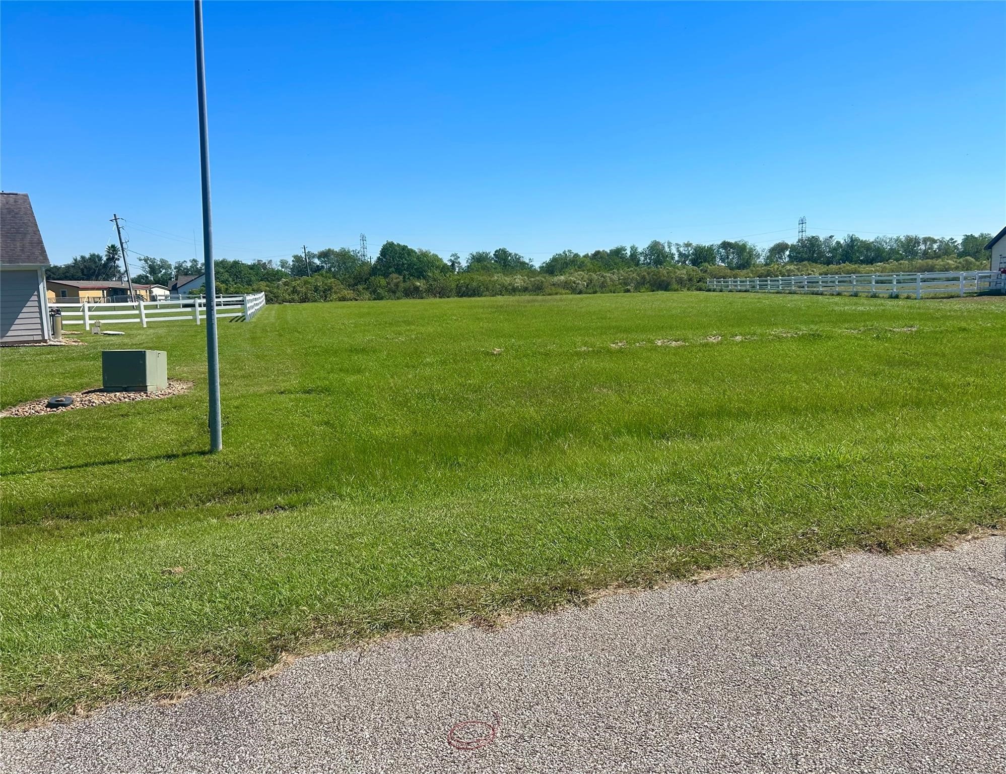 17327 Lake Ridge Circle Rosharon, TX 77583 - Photo 9 of 9 a view of a golf course with a lake